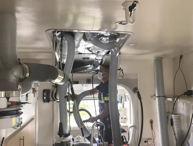 Hanover Air Duct Cleaning specialist performing precise mobile home duct cleaning in Hanover