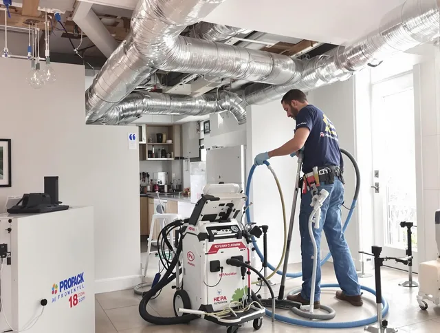 Hanover Air Duct Cleaning technician performing advanced pure duct cleaning with specialized equipment in Hanover
